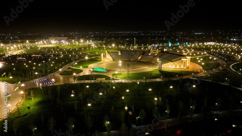 Yangi Ozbekiston (New Uzbekistan) park in Tashkent city at night photo