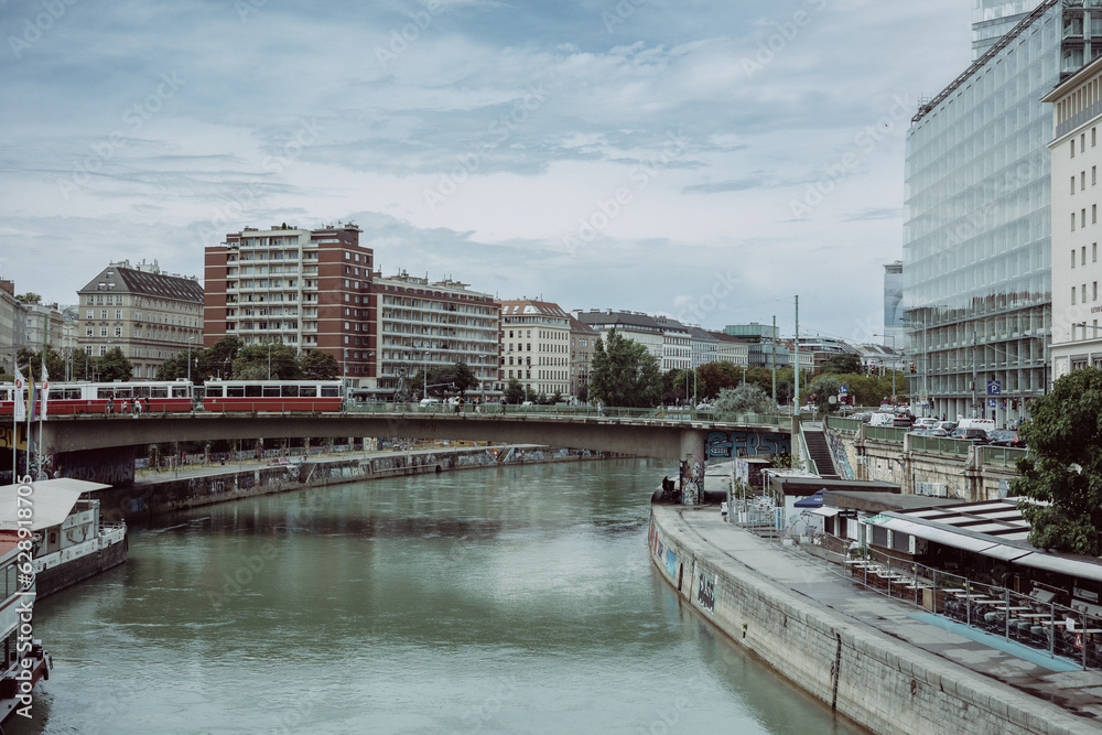 river side landscape of bridge and trams in Vienna Austria, central city