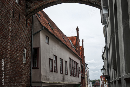 Gasse am historischen Gildehaus der Schiffergesellschaft in der Altstadt von Lübeck photo