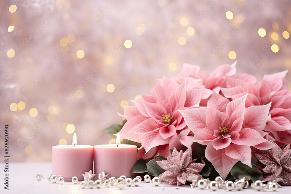 Pink candles with pink poinsettias flowers