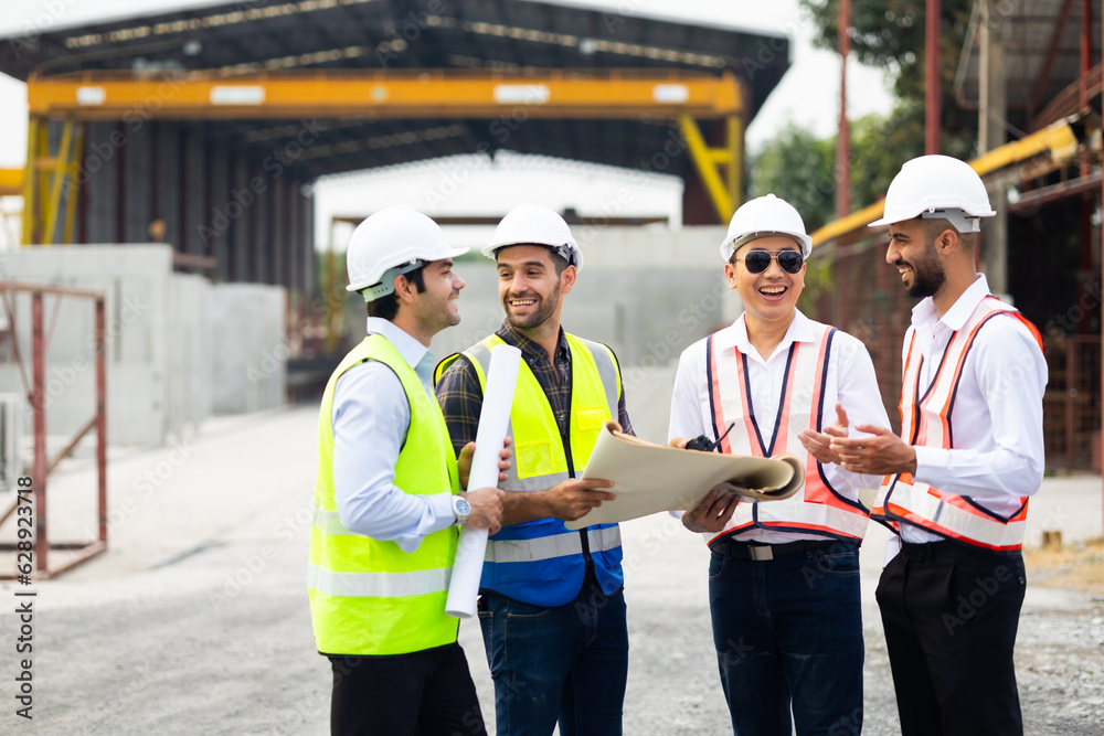 Heavy Industry Engineers teamwork. Diverse Professional builder, engineer construction worker working together at Prefabricated concrete walls Industry Manufacturing Factory. Unity and teamwork Heavy Industry Engineers teamwork. Diverse Professional builder, engineer construction worker working together at Prefabricated concrete walls Industry Manufacturing Factory. Unity and teamwork