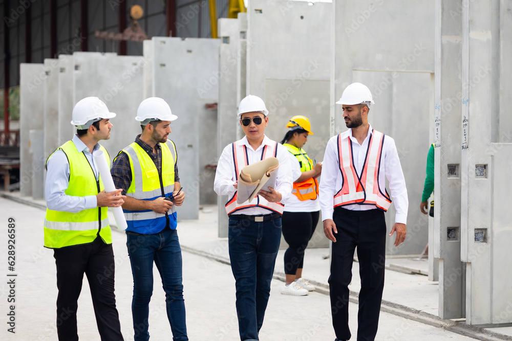 © NVB Stocker - Unity and teamwork. Heavy Industry Engineers teamwork. Diverse Professional builder, engineer construction worker working together at Prefabricated concrete walls Industry Manufacturing Factory © NVB Stocker - Unity and teamwork. Heavy Industry Engineers teamwork. Diverse Professional builder, engineer construction worker working together at Prefabricated concrete walls Industry Manufacturing Factory