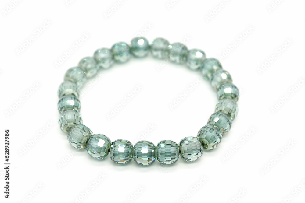 Closeup of a beautiful shiny bracelet isolated on a white background Closeup of a beautiful shiny bracelet isolated on a white background