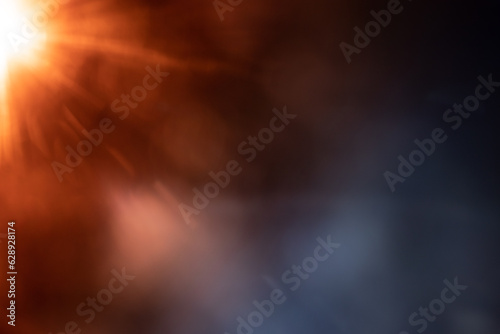 Blurred image Sun flare on the black background
