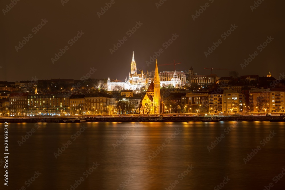 Stunning nighttime skyline from the banks of the Danube River in Buda, Hungary