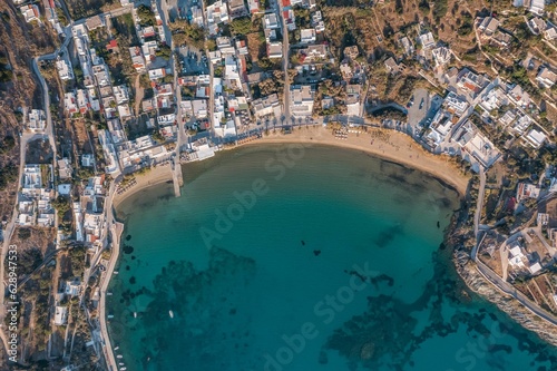 the city has an aerial view of a beach in the bay photo