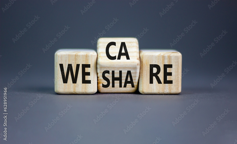 We share and care symbol. Concept word we share we care on wooden block. Beautiful grey table grey background. Business we share and care sharing is caring concept. Copy space. We share and care symbol. Concept word we share we care on wooden block. Beautiful grey table grey background. Business we share and care sharing is caring concept. Copy space.