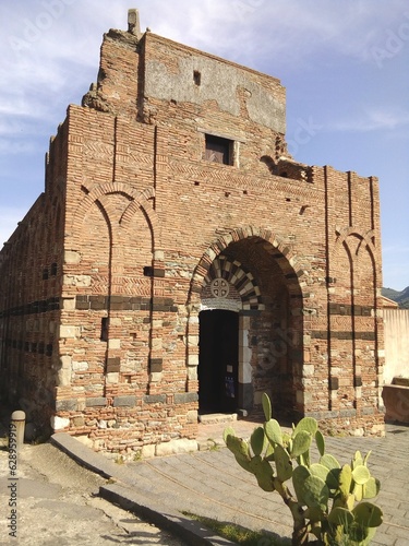 Antica chiesa normanna. Chiesa dei Santi Pietro e Paolo d'Agrò a Casalvecchio Siculo photo