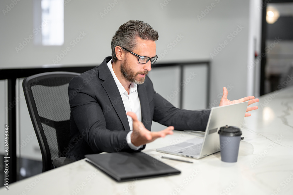 Surprised businessman working with laptop in office. Surprised business man using laptop. Surprised man using laptop at office workplace. Surprised Ceo manager office worker business people. Surprised businessman working with laptop in office. Surprised business man using laptop. Surprised man using laptop at office workplace. Surprised Ceo manager office worker business people.