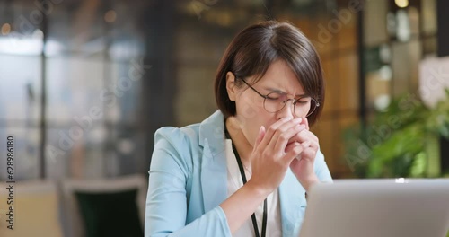 woman is sick at work