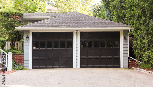 Secure sanctuary, garage symbolizes protection, ownership and shelter. Gateway between worlds, home and outside. Safety in the embrace of walls