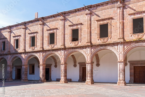 landmark clavijero cultural center courtyard and arched building facade of baroque architectural style in morelia michoacan mexico photo