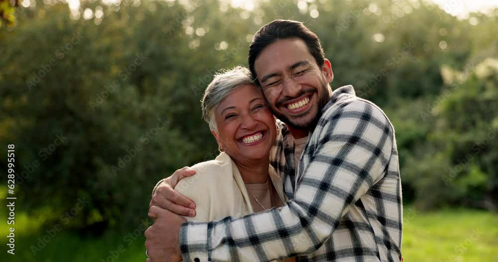 Face, man and hug mother at park on vacation, holiday or travel outdoor for bonding together. Portrait, mama and embrace happy adult child in forest, woods or countryside for love, care and smile