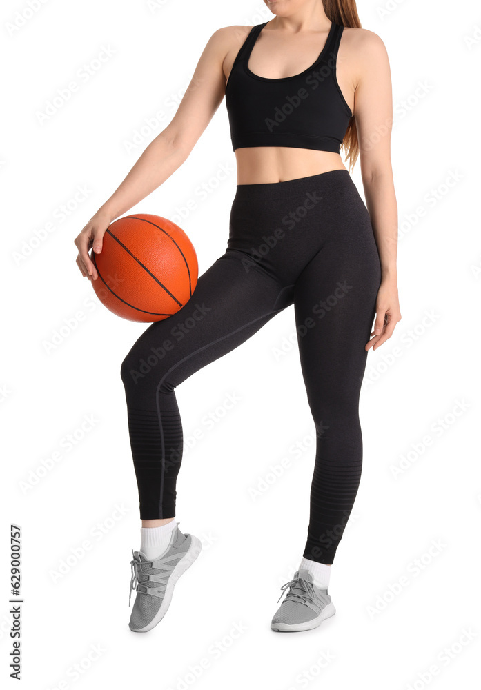 Young woman in sportswear and with ball on white background Young woman in sportswear and with ball on white background