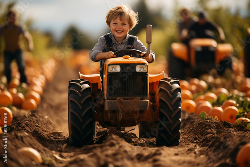 european boy riding a tractor on pumpkin patch farm autumn fall halloween