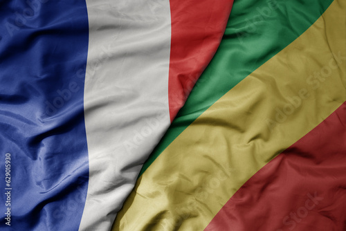 big waving realistic national colorful flag of france and national flag of republic of the congo . photo
