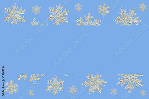 beautiful decorative snowflakes. background of white snowflakes on a blue background. postcard. holiday concept 
