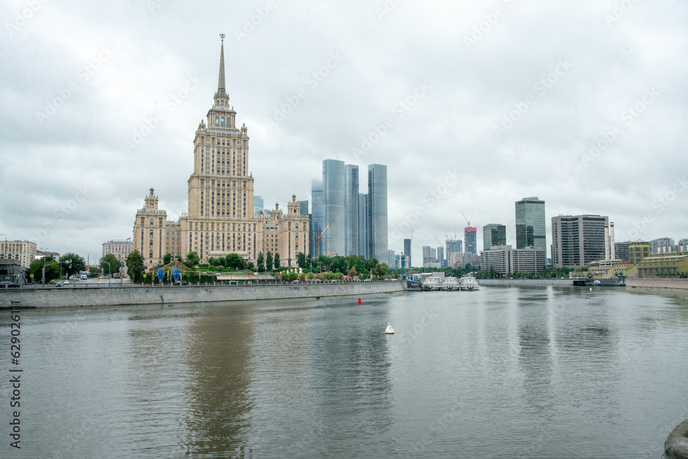 American hotel opposite Government building of Russia  and Moscow city in distance and  Moscow river (building - Stalin vysotka , one of 8 buildings)