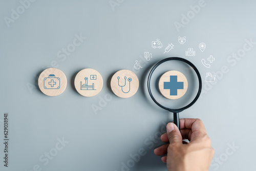 Fototapeta Naklejka Na Ścianę i Meble -  Health insurance concept. people hands holding plus and healthcare medical icon, health and access to welfare health concept...
