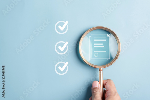 Online survey filling out and digital form checklist by laptop computer, Document Management Checking System, online documentation database and process manage files.