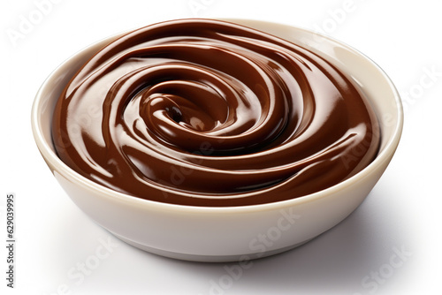 velvety chocolate sauce flows gracefully into a pristine white bowl, perfect for dessert or baking. culinary topics, or for dessert and chocolate recipe books