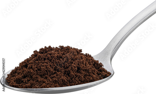 Ground coffee beans in spoon isolated, full depth of field photo