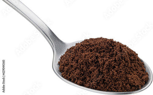 Ground coffee beans in spoon isolated on white background  full depth of field
