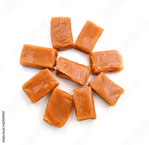 Caramel candies isolated on white background