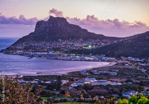 Hout Bay beachfront, harbour and the fisherman town at the foothill of the mountain, Cape Town, South Africa