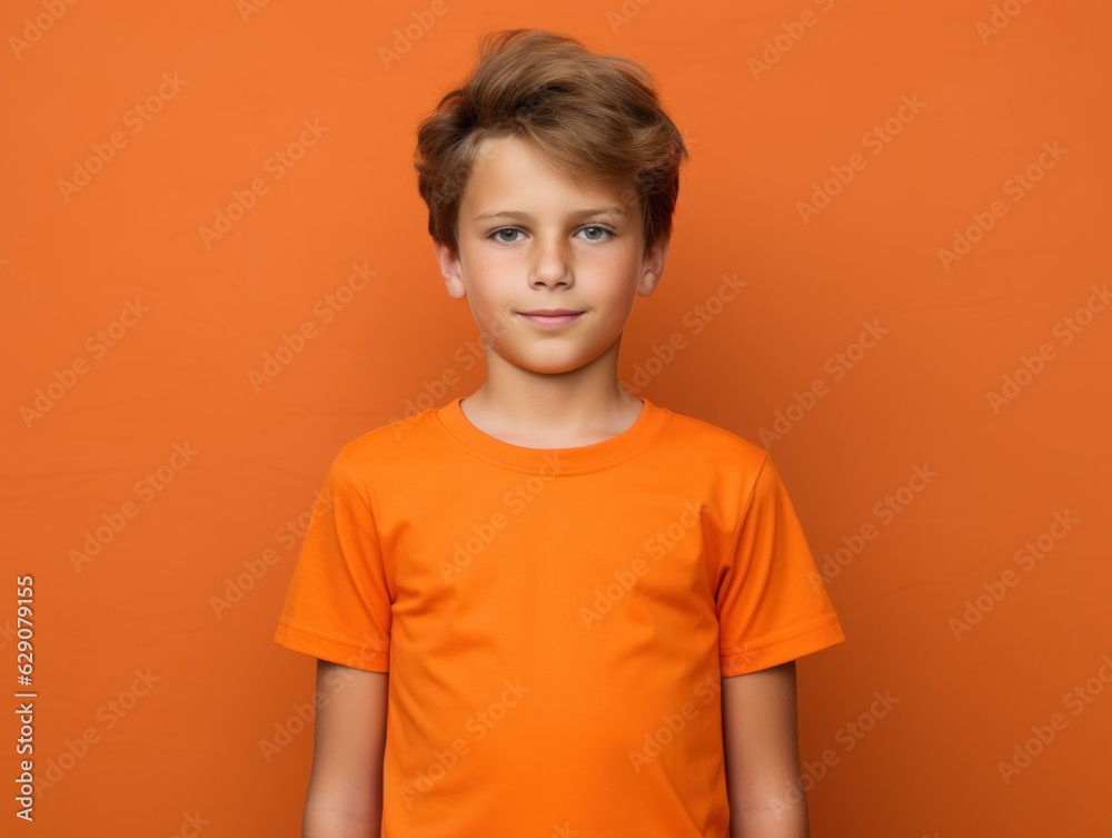Young fictional little boy wearing a plain orange t-shirt. Isolated on a plain colored background. Generative AI. Young fictional little boy wearing a plain orange t-shirt. Isolated on a plain colored background. Generative AI.