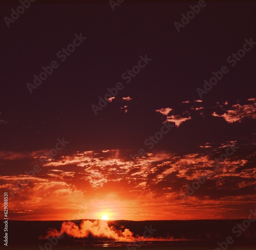 Yellowstone sunset and steamy landscape