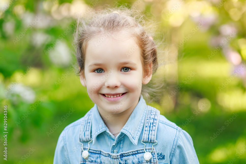 Little cute girl laughs. Sunny beautiful summer day. The baby is happy.
Little cute girl laughs. Sunny beautiful summer day. The baby is happy.