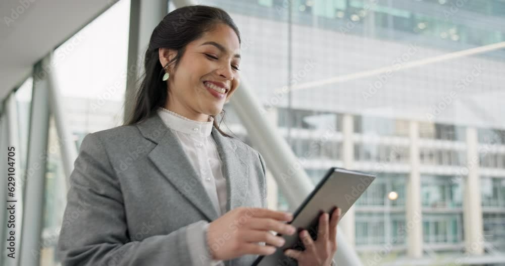 Tablet, walking and happy business woman in office online for communication, networking and internet. Corporate worker, planning and female person on digital tech for social media, website and report Tablet, walking and happy business woman in office online for communication, networking and internet. Corporate worker, planning and female person on digital tech for social media, website and report