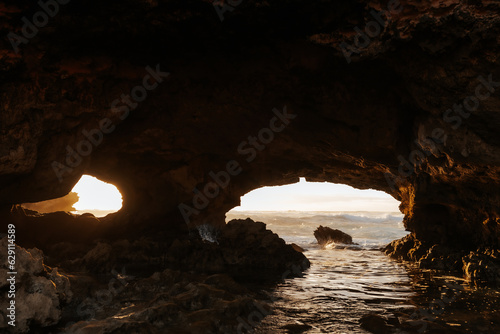 Sunlight through a cave at the beach