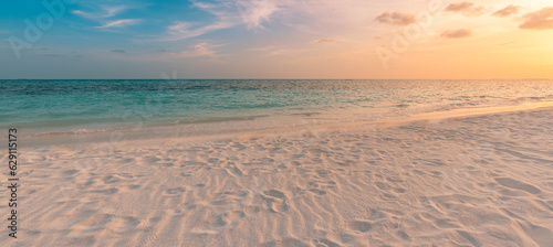 Closeup sea sand beach. Beautiful beach landscape. Inspire tropical seascape coast horizon. Mediterranean sunset sky calm tranquil relax summer mood. Positive energy meditation panoramic island view