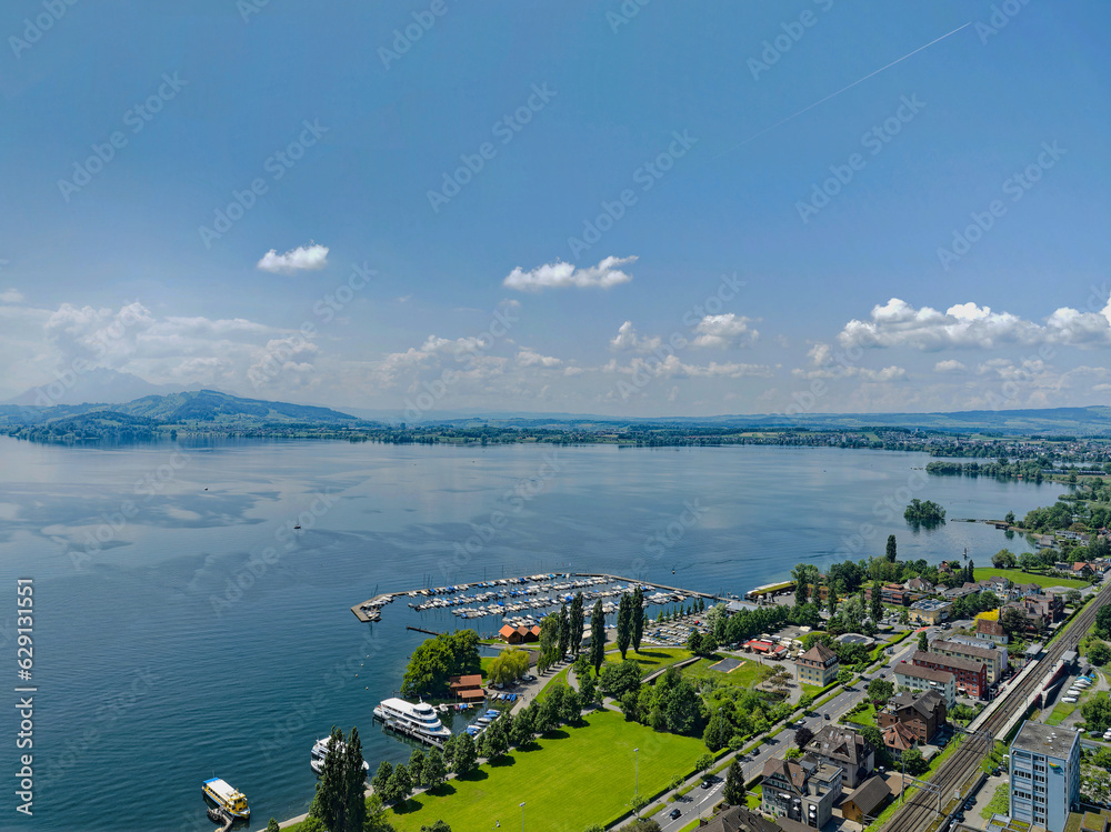 Aerial view of Swiss City of Zug with Lake Zug and lakeshore on a sunny spring day. Photo taken May 22nd, Zug, Switzerland.