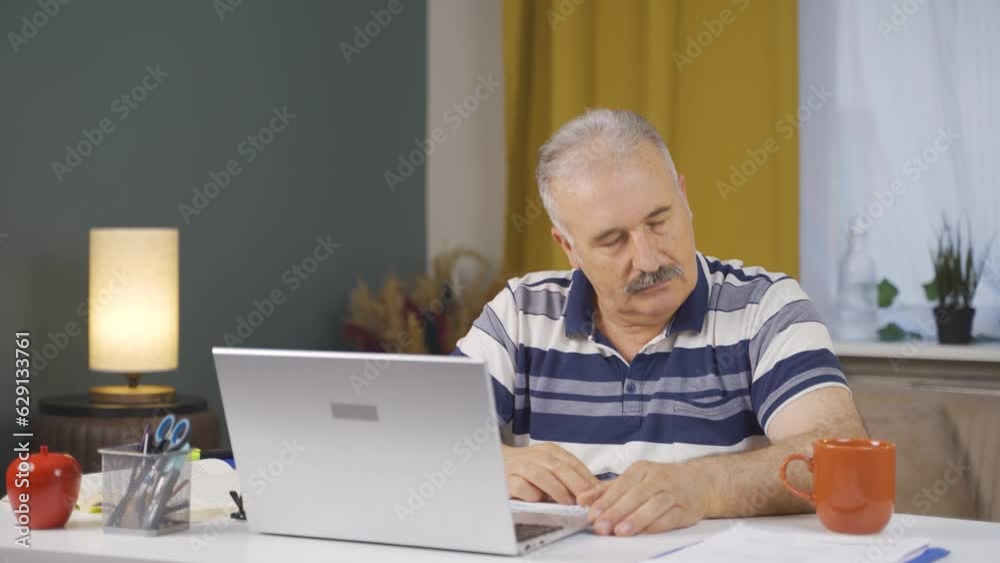 Home office worker old man nods to the camera. Home office worker old man nods to the camera.