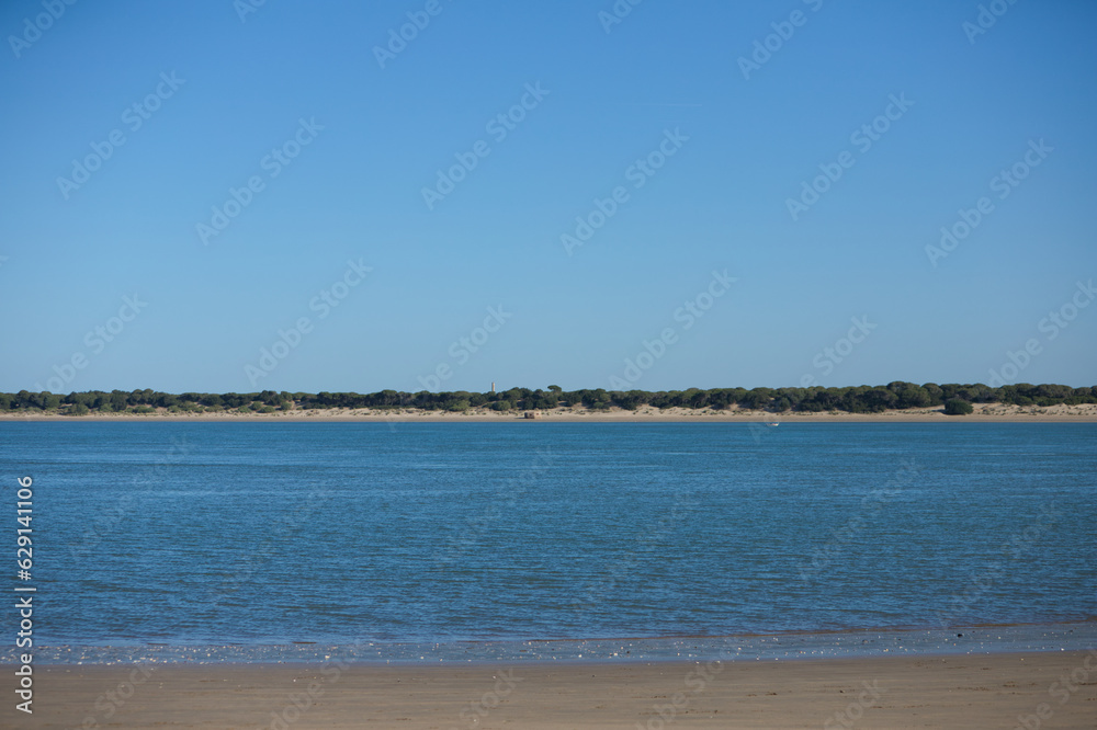 Doñana National Park and Guadalquivir river from Sanlucar de Barrameda. Ecological reserve of Europe and Biosphere Reserve in 1980 by Unesco. Province of Huelva, Spain.