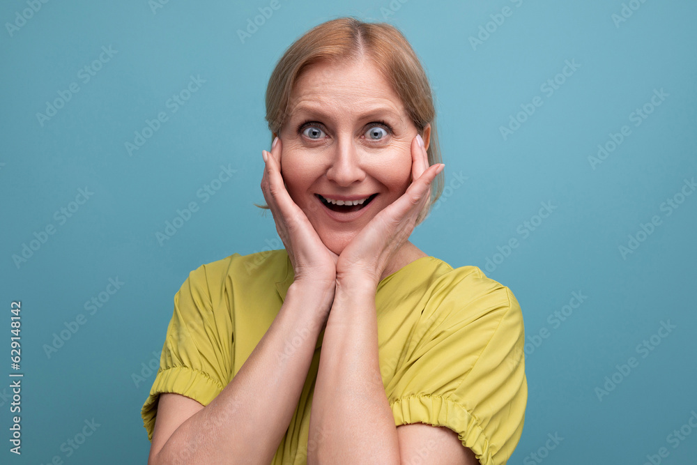 portrait of energetic healthy middle aged blond woman with t-shirt portrait of energetic healthy middle aged blond woman with t-shirt
