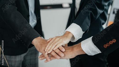 Wallpaper Mural Team workers, men and women, join hands to join forces to join forces to work for the industry for success. Teamwork and professional colleagues : Workers' hands, teamwork concept. Torontodigital.ca