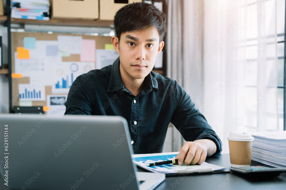 Fototapeta premium Smiling confident mature businessman leader looking at camera in office.
