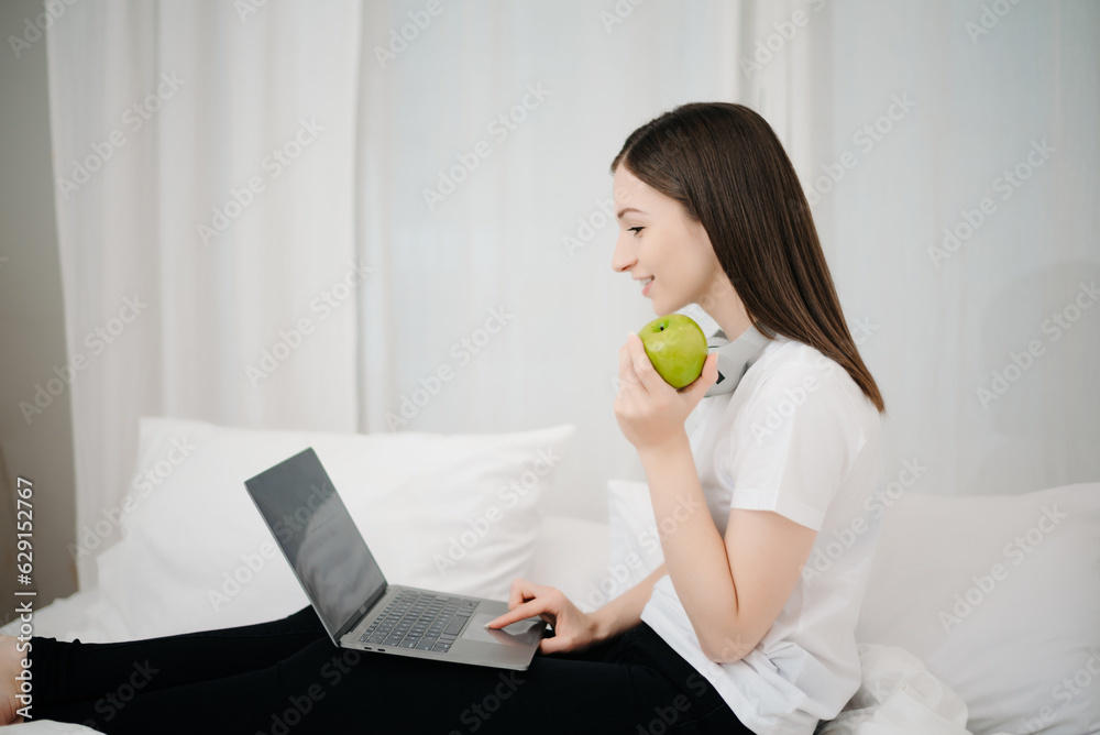 Good Healthy woman drinking tea and resting in white bed at bedroom. Lifestyle at home concept in morning.. Good Healthy woman drinking tea and resting in white bed at bedroom. Lifestyle at home concept in morning..