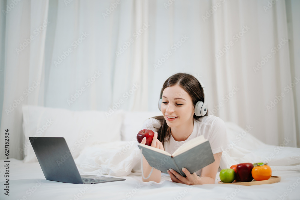 Portrait of Good Healthy young woman reading book and resting in bed at bedroom.  in morning lifestyle concept.