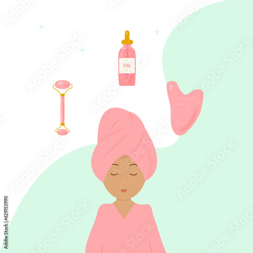A girl in a towel on her head and a pink robe, with a facial massage roller, gua sha scraper, massage oil.
The concept of beauty routine, facial skin care, relaxation, spa.
Flat vector illustration.