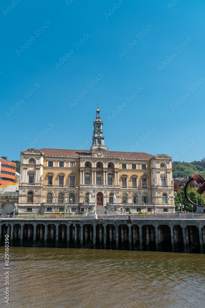 Beautiful City Hall building of the Bilbao city, built in Baroque style. In front of the building is the river Nervion. Travel destination in North of Spain
