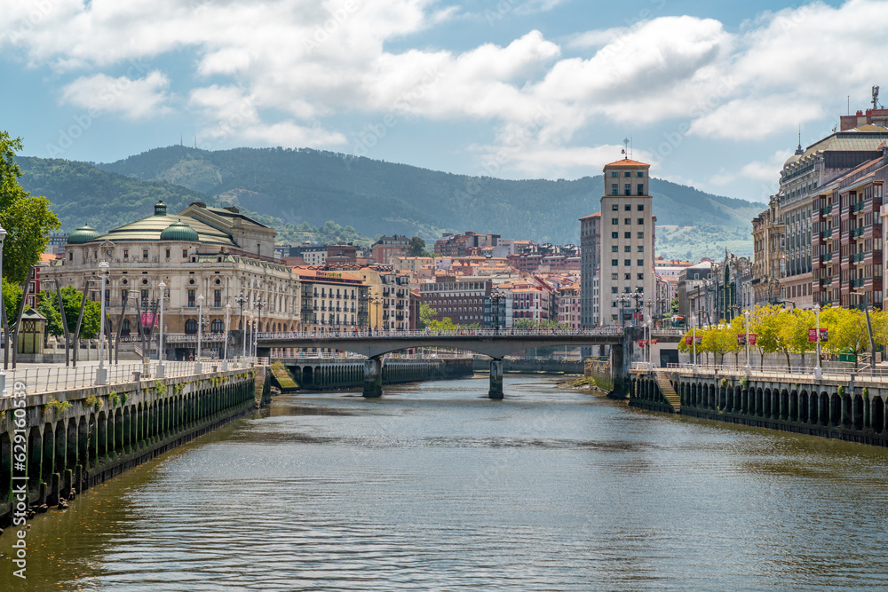 Promenade area of the River Nervion. In background the old city of Bilbao in front plane the river Nervion. Travel destination in North of Spain, Basque Country