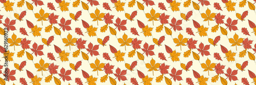 seamless autumn pattern of yellow, green and orange leaves, bright vector illustration 