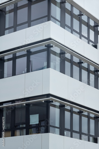 facade of a white modern office building