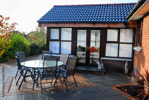 Modern sunroom and patio table.
