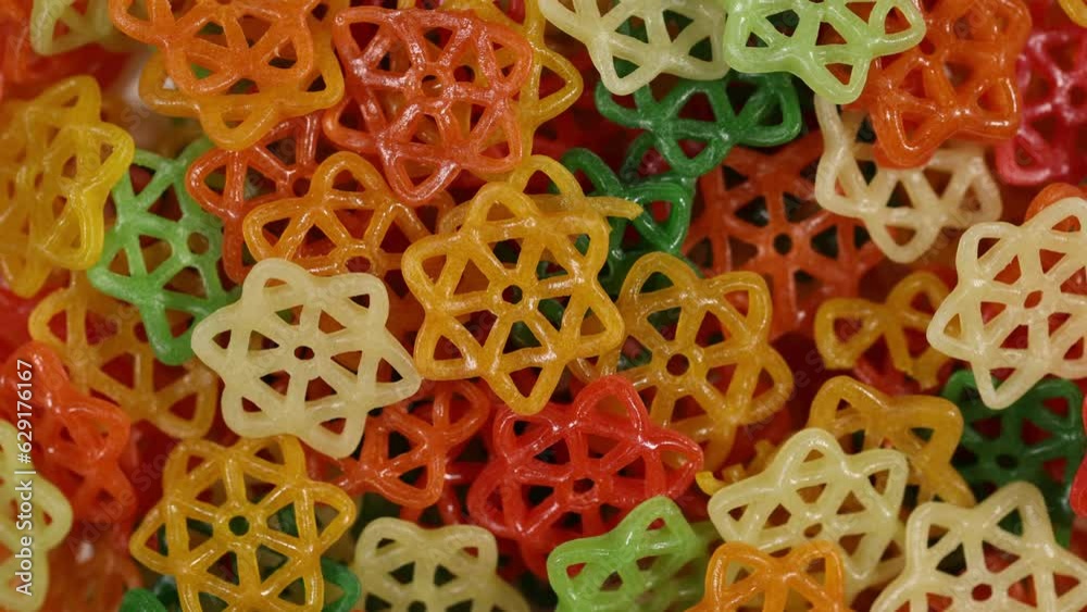 Raw colorful start shaped far far fryums clockwise spinning